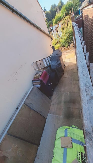 www.truthincontext.co.uk Paving intact in space between both houses. View is towards rear garden.