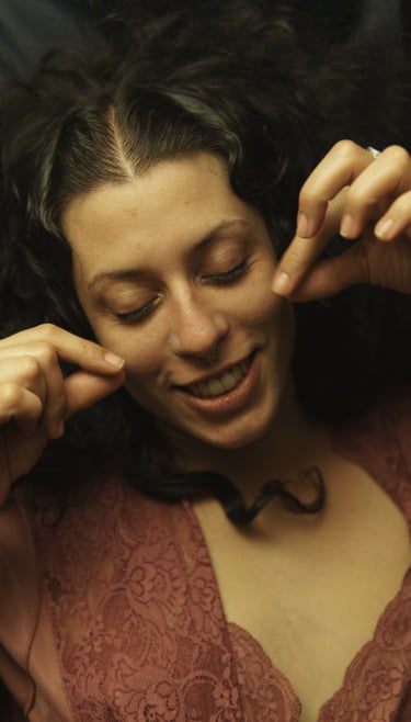 a woman smilling holding her chick