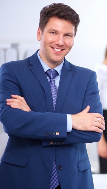 a-smiling-business-owner-registers-confidence-in-his-strategic-communications-plan