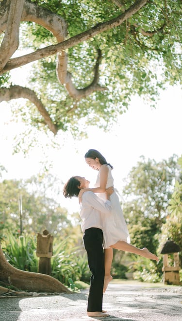 Couple portrait under a tree during an intimate photography session at Novotel Bali Benoa in Tanjung Benoa Bali.