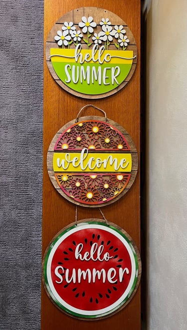 laser cut and colorfully painted wooden door or wall hangers