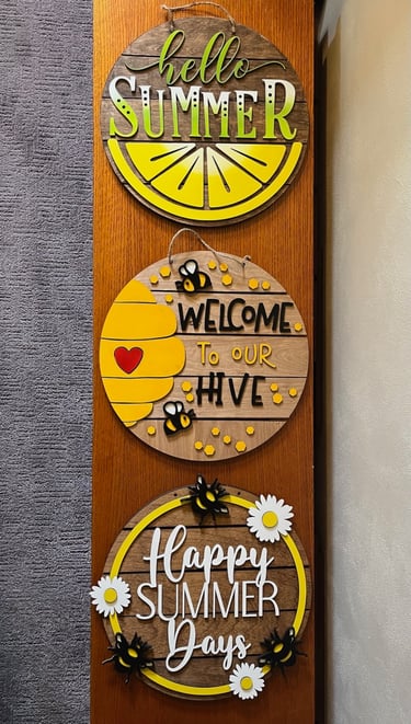 laser cut and colorfully painted wooden door or wall hangers
