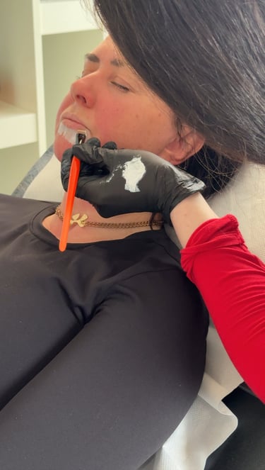 Lip blush treatment in progress at Inkglow Durham studio