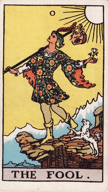 The Fool tarot card meaning – new beginnings, potential, and taking a leap of faith.