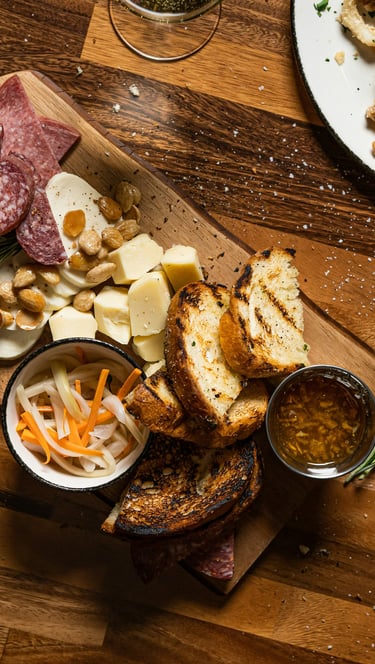 Handcrafted cherry and maple charcuterie serving board by Koshur Chaan