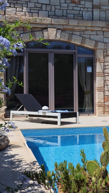 a pool with a patio - pool deck