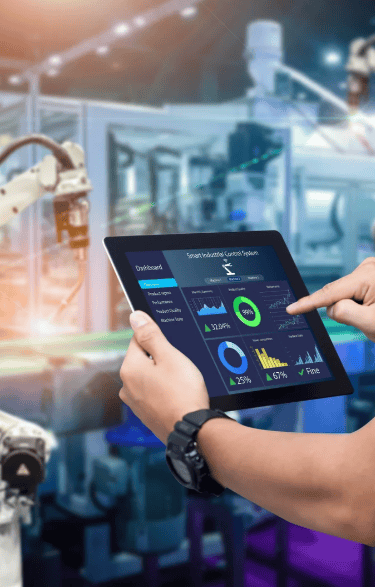 controls technician holding a tablet computer and a tablet with a robot