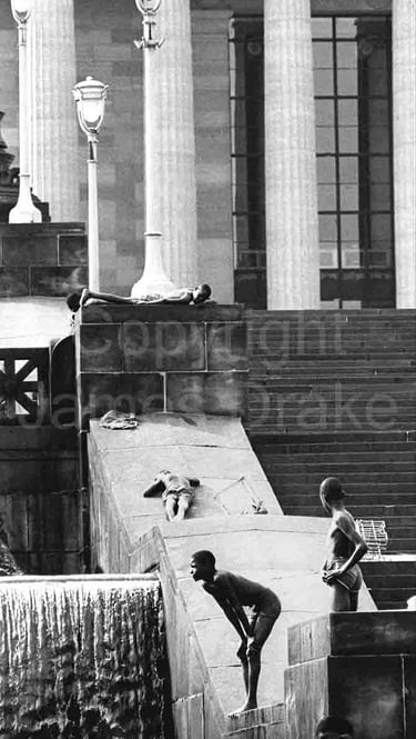 Swimmers in the fountains of the Philadelphia Museum of Art in the 1960s by James Drake