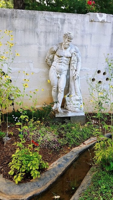 Helen GA - a life-size statue standing in a small garden at Uhuburg Castle