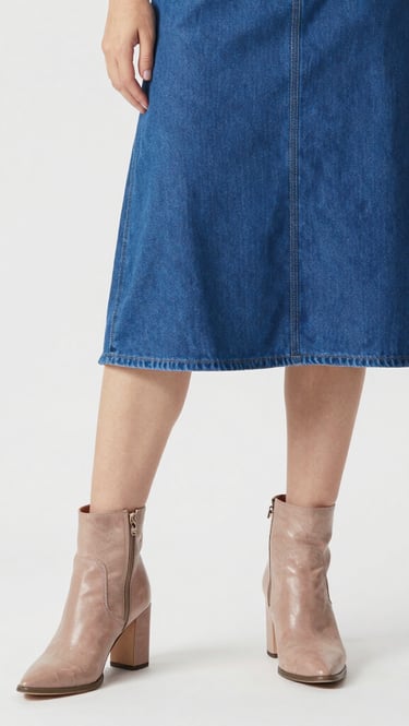 woman in blue dress standing