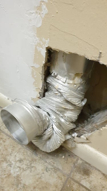 A crushed dryer vent connection hose in Estero Florida