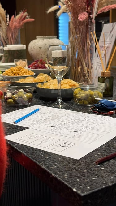 Wine tasting table setup with glasses and tasting notes for guided wine tasting experience