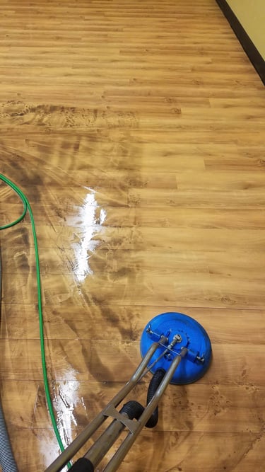 Vinyl floor cleaning by Grossbusters