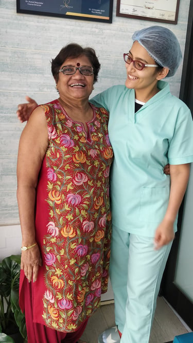 Happy dental patient after painless Dental Implants at top dental clinic near orlem malad west in mumbai