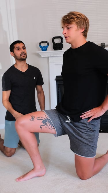 person being shown an exercise technique to help with back pain