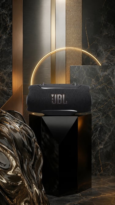 Enceinte JBL Xtreme 5 noire posée sur un socle devant un décor premium en marbre et métal doré