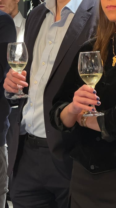 Guests enjoying private wine tasting experience with sommelier