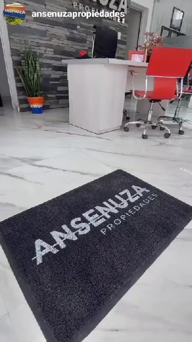 Felpudo personalizado con logo inmobiliaria ansenuza