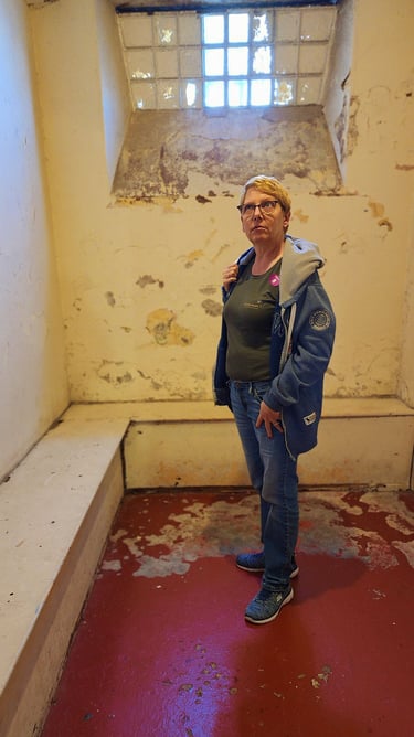 Lady in Crumlin Road Gaol in Belfast, Ireland