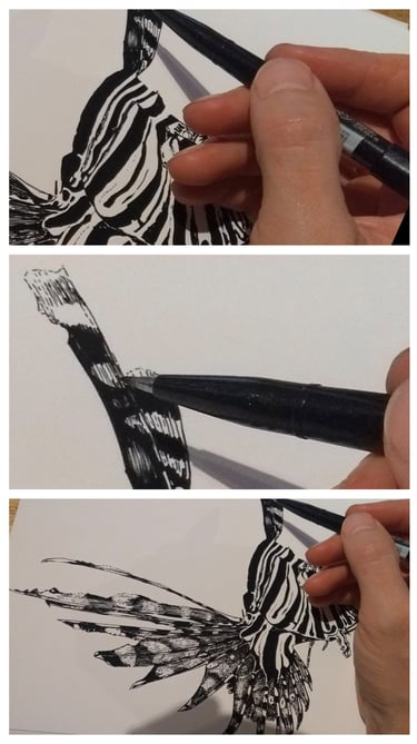 a person holding a brush and a brush