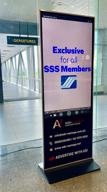 alt="Government agency airport advertisement at Bicol International Airport Philippines"