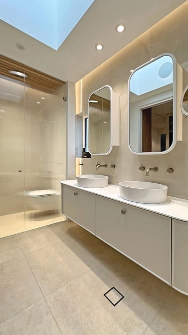 luxury master ensuite renovation in Mosman with freestanding tub, fluted glass partitions, and oak-lined ceiling