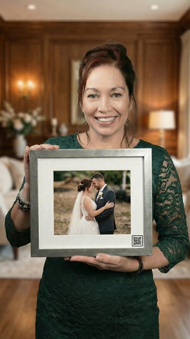 a woman holding a picture of a wedding shot with a QR code from keepsakesqr