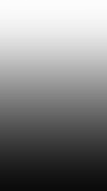 a black and white photo of a man in a suit and tie