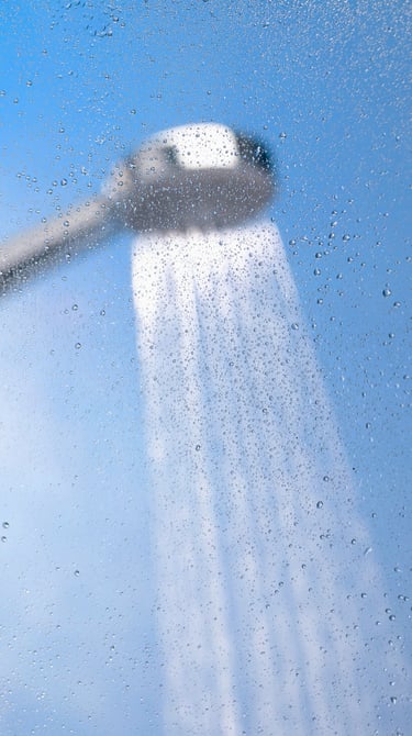 Blurred water spray and falling droplets background