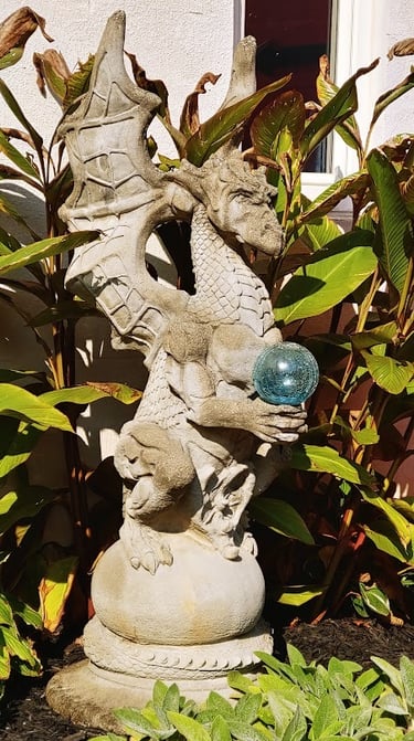 Helen GA - a dragon statue with crystal ball represents wisdom & prosperity at Uhuburg