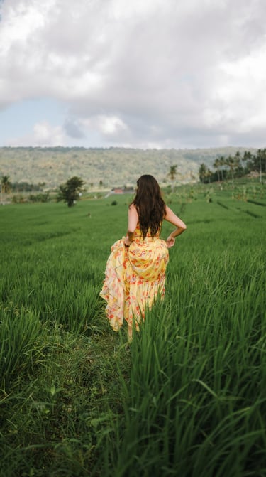 Lifestyle portrait in green ricefield landscape Karangasem Bali