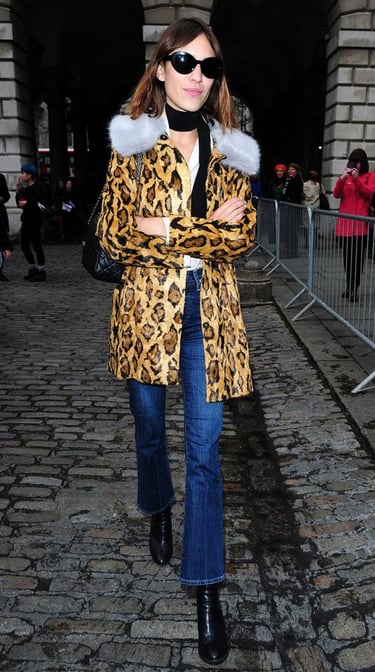 Alexa Chung wearing Shrimps coat outdoors.