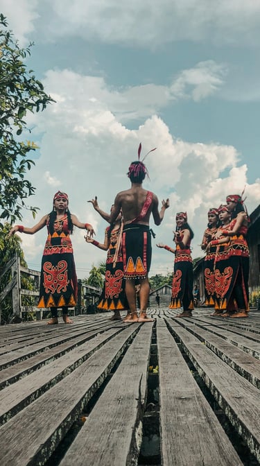 a group of people in traditional dress dancing in a village