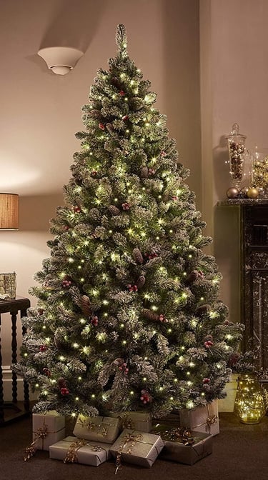 a christmas tree with a christmas tree in the middle of the room