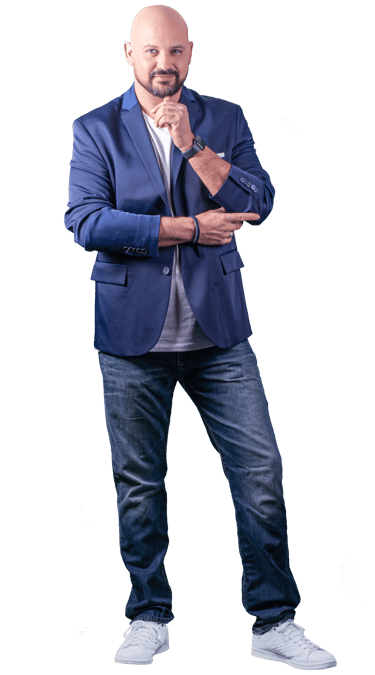 a bald bald man in a blue suit and white sneakers