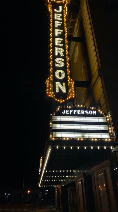 A LED signage outside of the Jefferson Theatre lighting up the night sky in Beaumont, Texas.