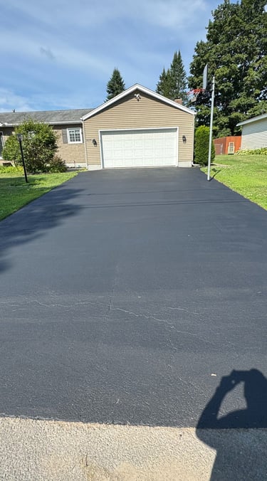 A freshly sealed driveway