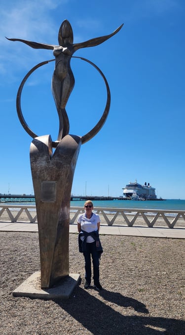 Lady Poses at the Monument to Women in Puerto Madryn, Argentina
