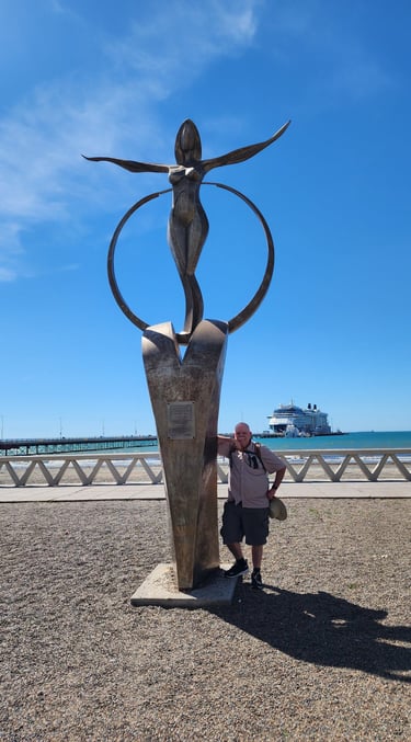 The Pirate poses at the Monument for Women in Puerto Madryn, Argentina