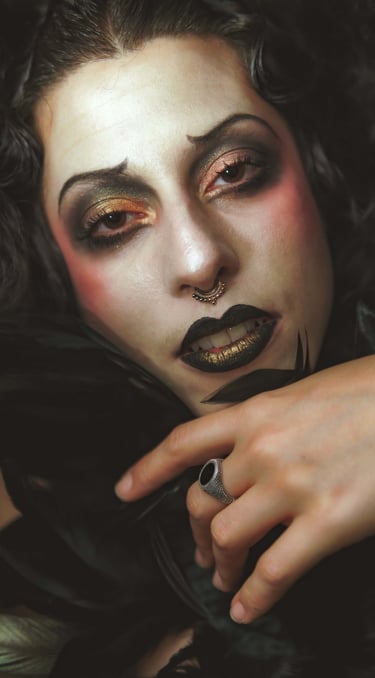 a cabaret performer with a black and white makeup and a black and white makeup
