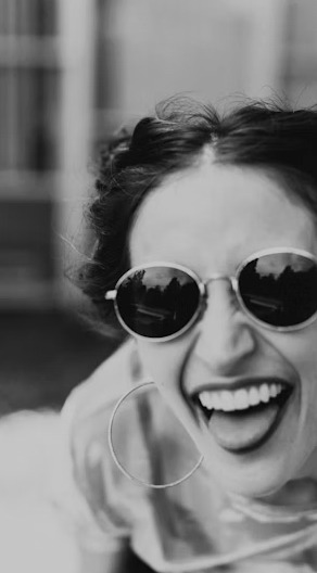 Adult laughing at astronomy joke