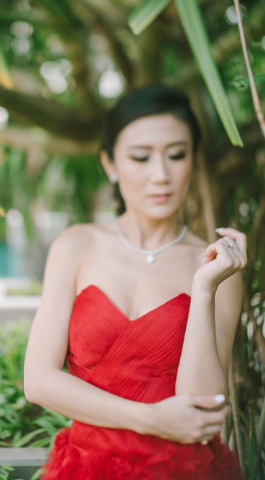 Bridal portrait in red gown at The Ritz-Carlton Nusa Dua Bali.