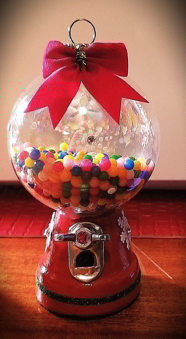 Christmas ornament crafted like a gumball machine.
