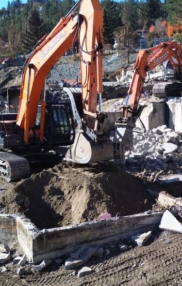 two excavators digging