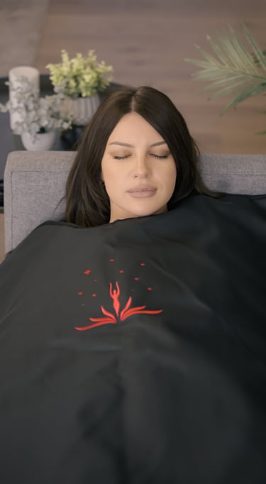 Lifestyle photo of woman using Healing Temp sauna blanket by BrandNests creative agency.
