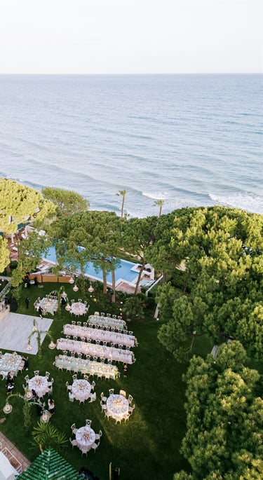 Destination wedding setup and altar in the seaside gardens of Villa El Rincon in Marbella
