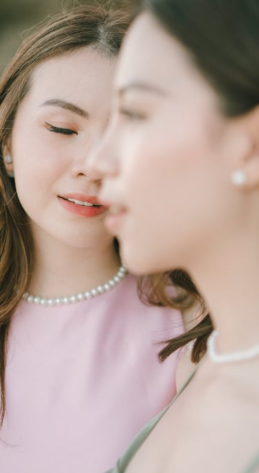 Close portrait detail of two friends during photoshoot at Geger Beach Nusa Dua Bali