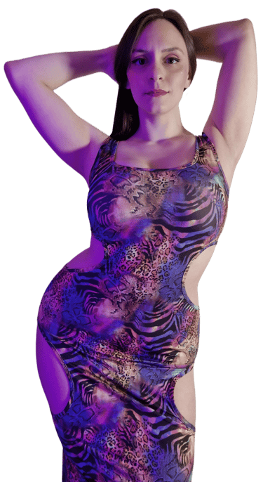 Mistress Nereid is confidently showing off Her hourglass shape in a sexy animal-print cut-out dress