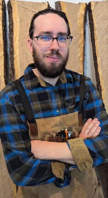 Tony Van Sant furniture maker in blue plad shirt