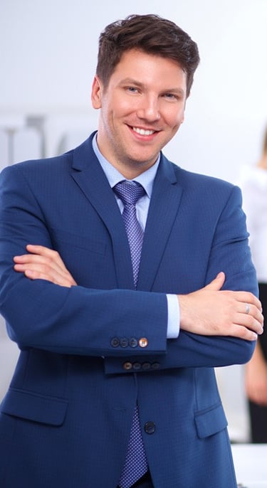 a-smiling-business-owner-registers-confidence-in-his-strategic-communications-plan